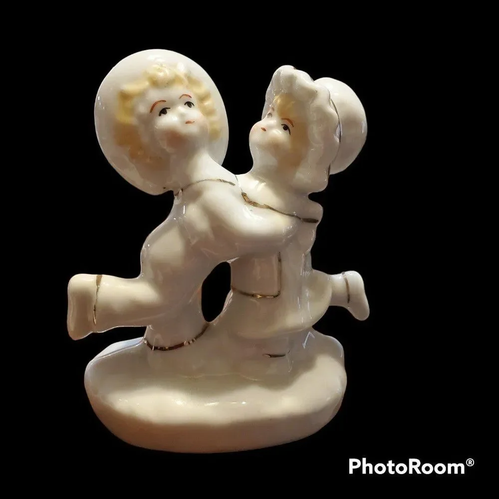 Sophia-Ann Porcelain Dancing Boy and Girl Figurine White with Gold trim.